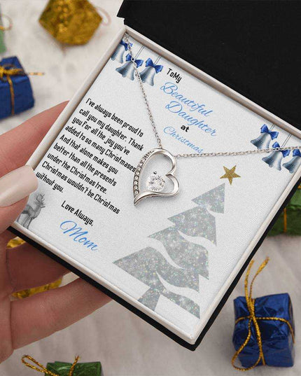 white gold forever love necklace in soft box in model's hand