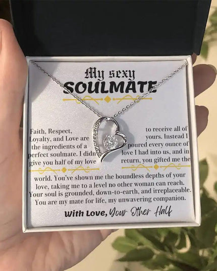 a white gold forever love necklace up close