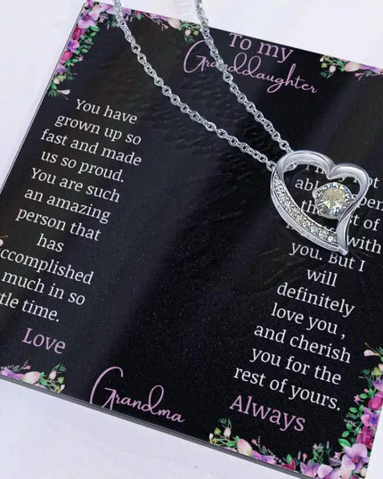 Forever Love Necklace with a white gold charm on a for granddaughter from grandpa greeting card with necklace slid to the right side of greeting card