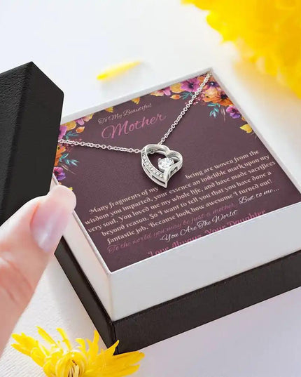 white gold forever love necklace in soft box angled left