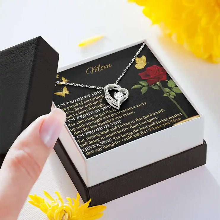 white gold forever love necklace in two-tone box angled left