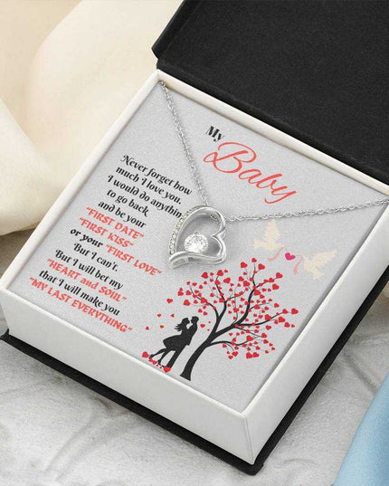 white gold forever love necklace in a soft box angled right