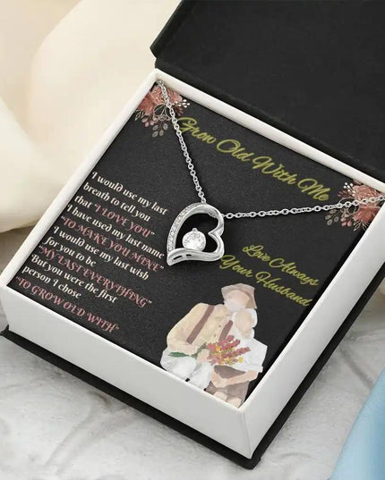 white gold forever love necklace in two-tone box angled left