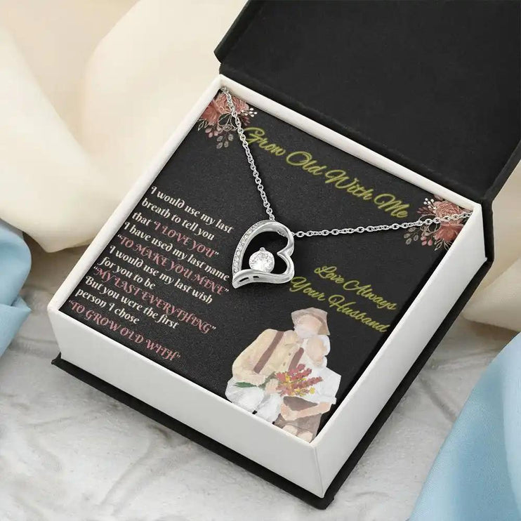 white gold forever love necklace in two-tone box angled left