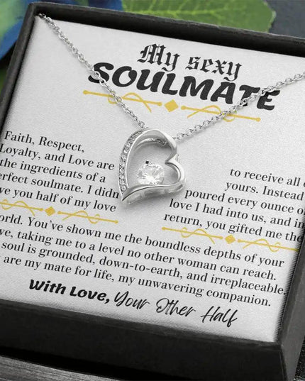 a white gold forever love necklace up close angled to right