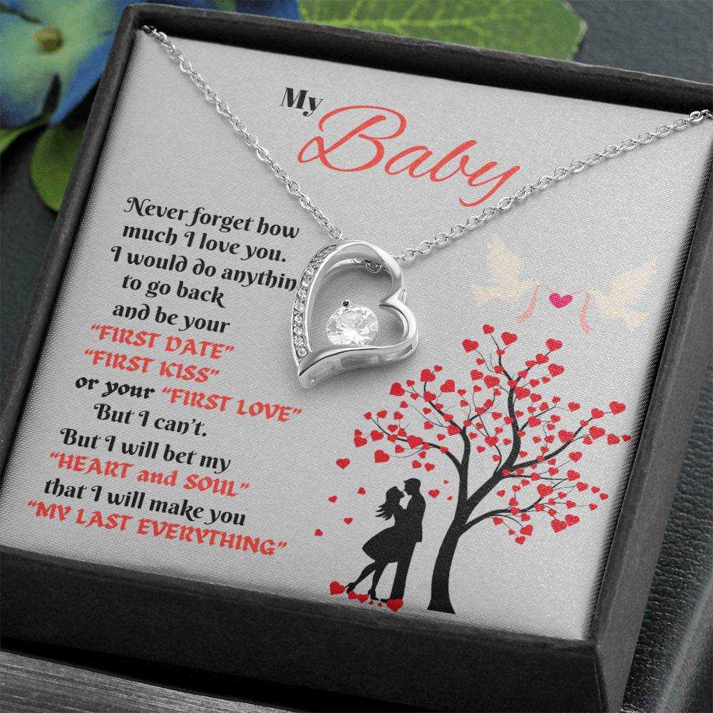 white gold forever love necklace in a soft box angled left