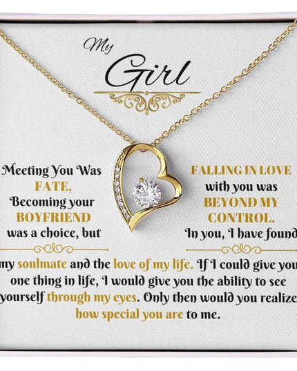 gold forever love necklace in a soft box up close