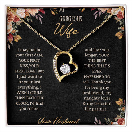 A yellow gold Forever Love Necklace on a to wife greeting card in a two-tone box.
