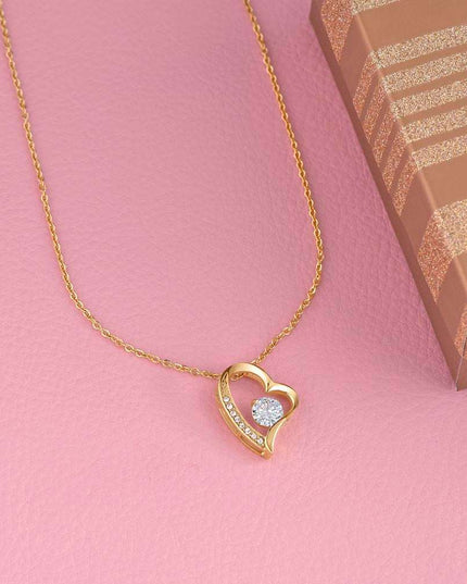 yellow gold forever love necklace on a pink cloth
