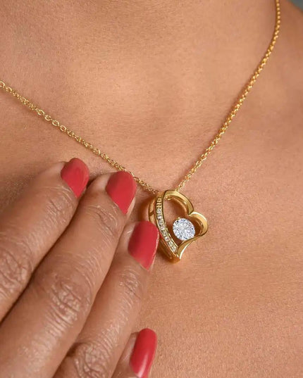 yellow gold forever love necklace  on model's neck