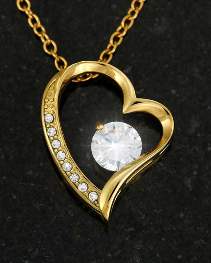 yellow gold forever love necklace up close of charm