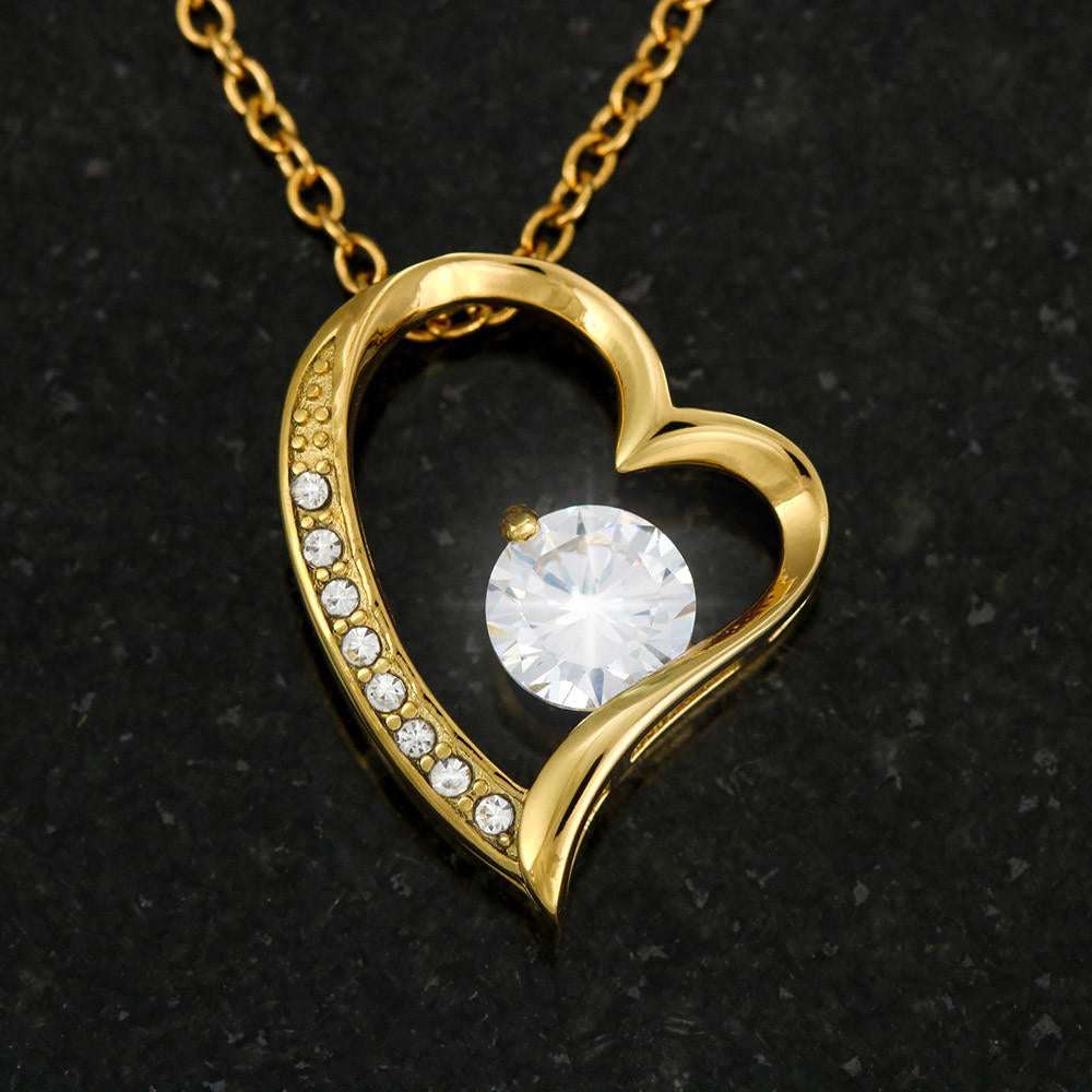 yellow gold forever love necklace up close of charm