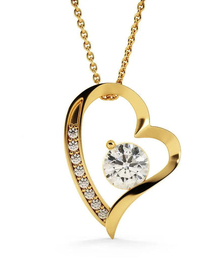 yellow gold forever love necklace hanging on white backdrop