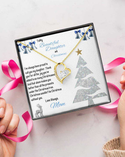 yellow gold forever love necklace in a soft box being gift wrapped