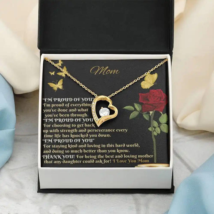 yellow gold forever love necklace in two-tone box close up