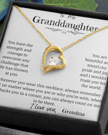 a yellow gold forever love necklace up close angled to the right.