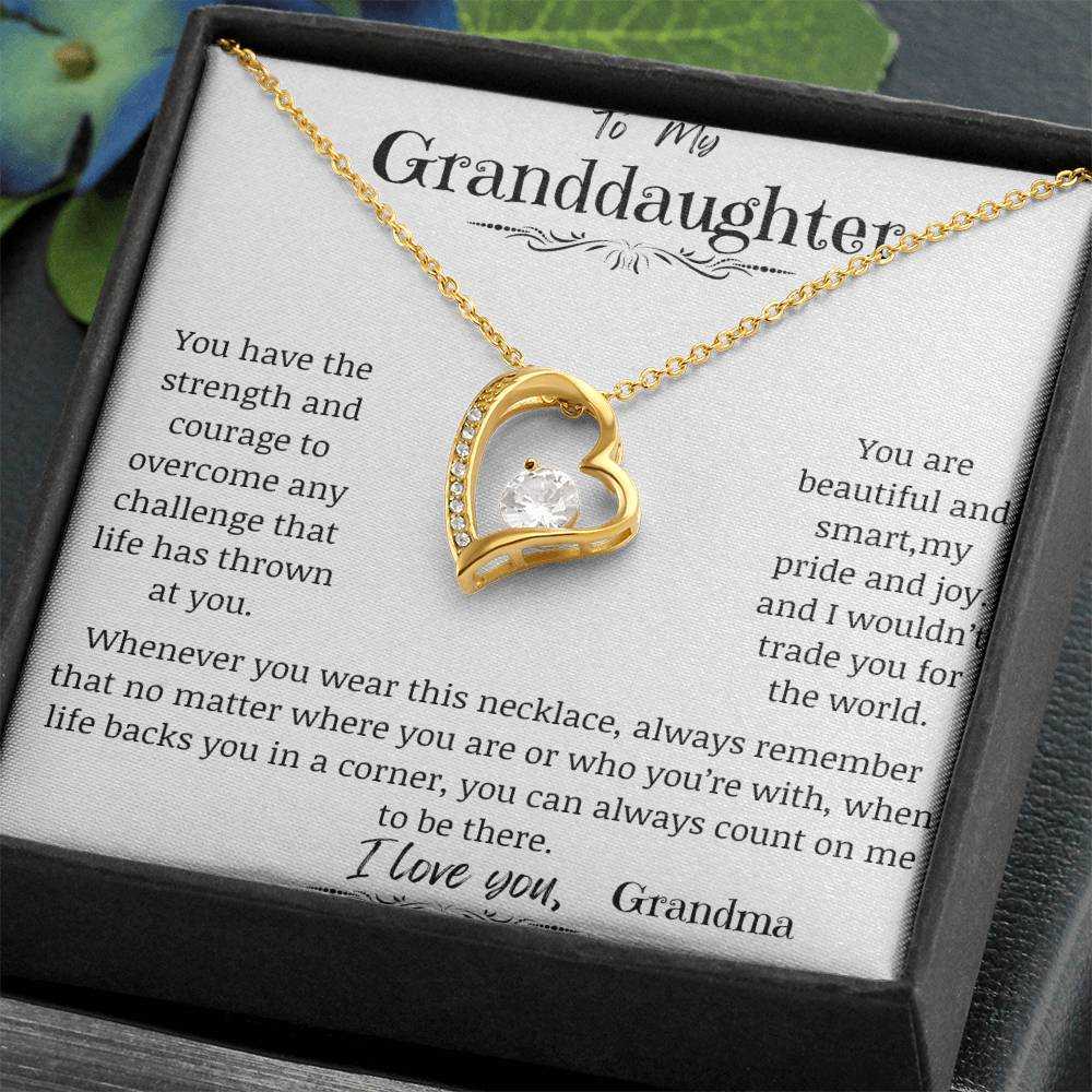 a yellow gold forever love necklace up close angled to the right.