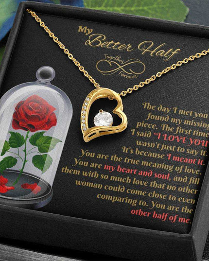 yellow gold forever love necklace in a soft box angled right