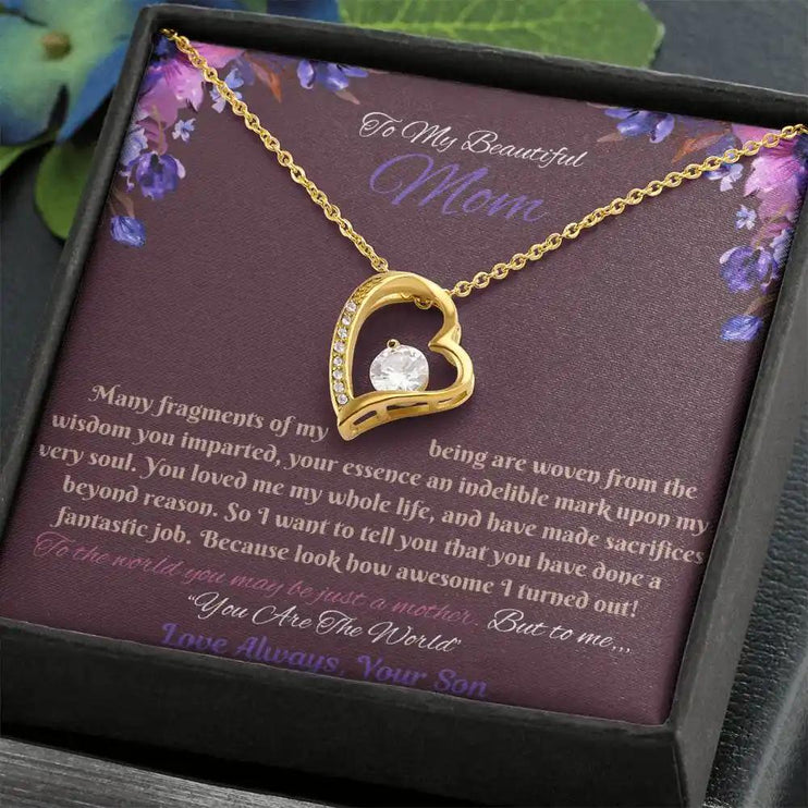 yellow gold forever love necklace in soft box angled right