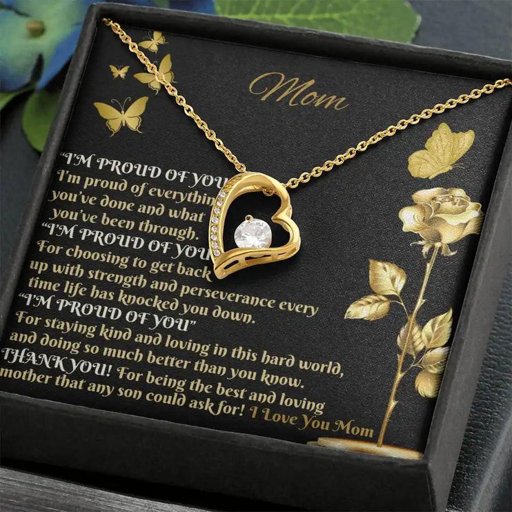 yellow gold forever love necklace in two-tone box angled left