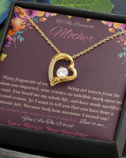 yellow gold forever love necklace in soft box angled right