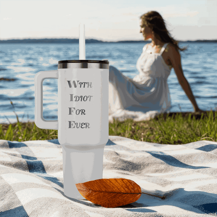 white tumbler 40oz pinnacle on a sandy beach 