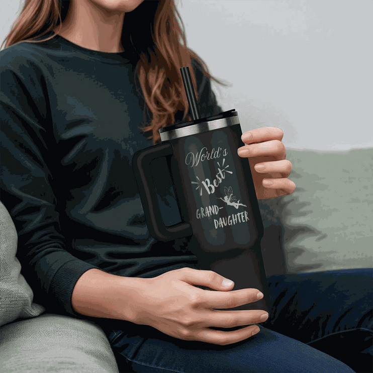 black tumbler 40oz pinnacle in a model's hand