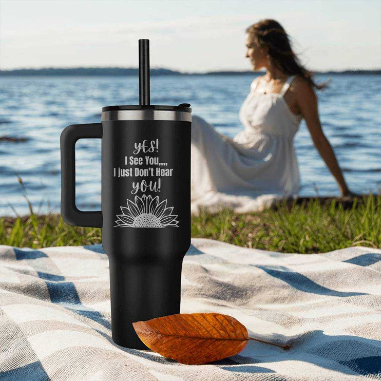 black pinnacle 40oz tumbler on beach