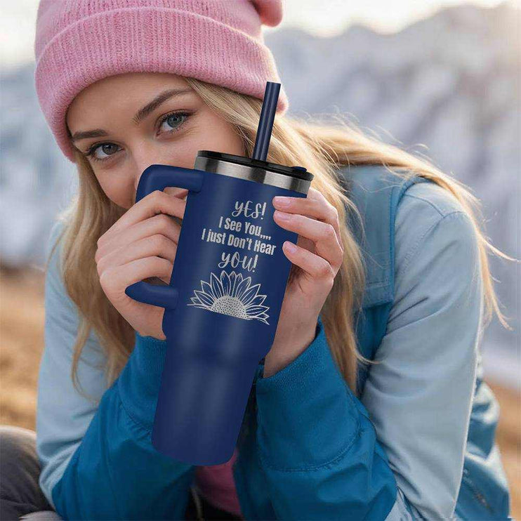 blue pinnacle 40oz tumbler in girls hand