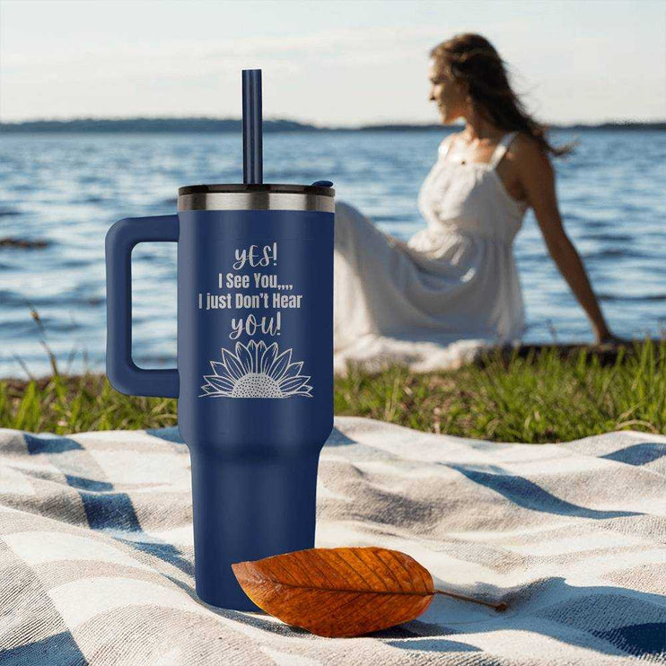 blue pinnacle 40oz tumbler on beach