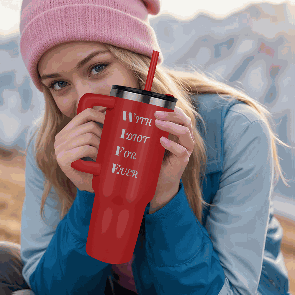 red tumbler 40oz pinnacle in a model's hands