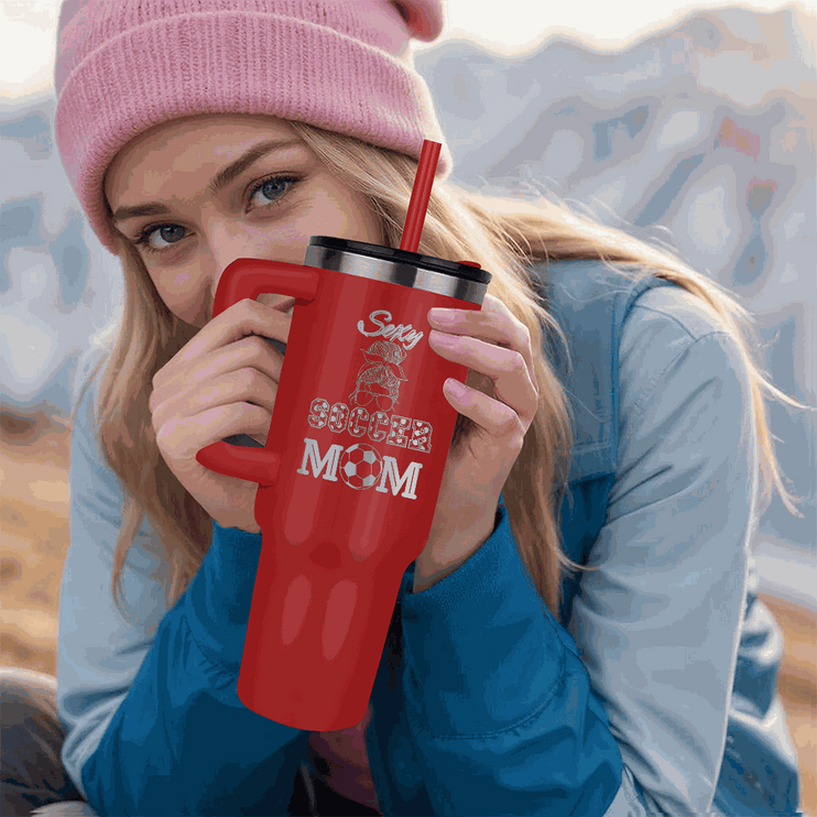 red tumbler 40oz pinnacle in model's hands