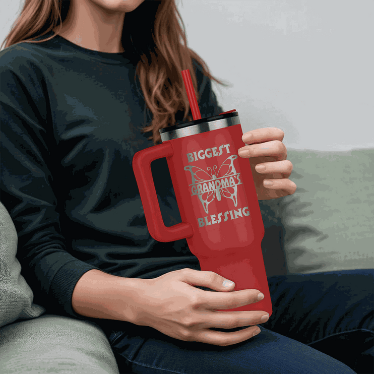 red tumbler 40oz pinnacle in the hands of a young model