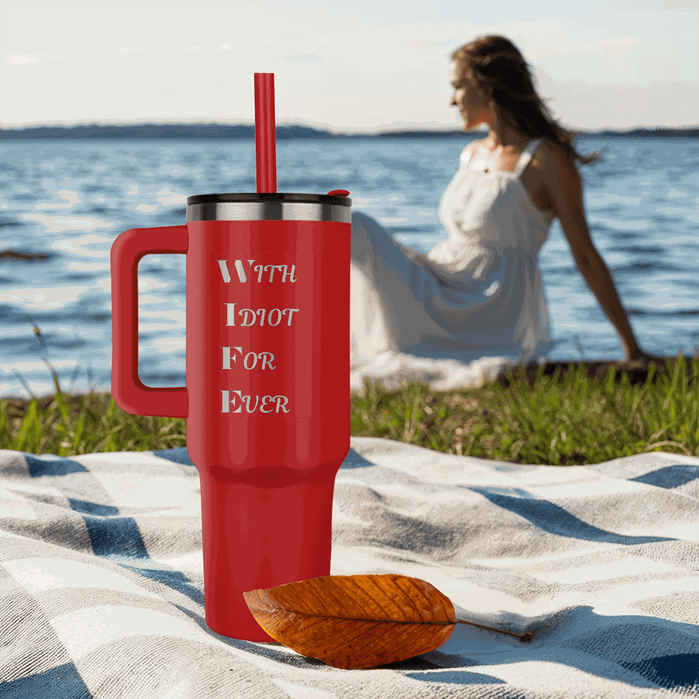 red tumbler 40oz pinnacle on a sandy beach