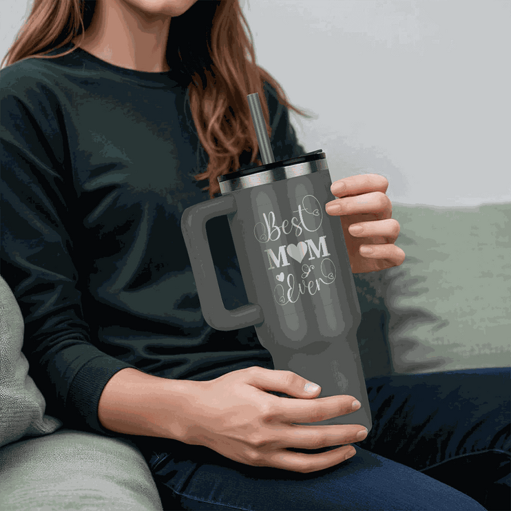 grey tumbler 40oz pinnacle in model's hands