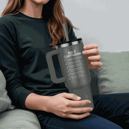 grey tumbler 40oz pinnacle in model's hands