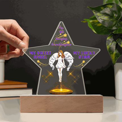 12v acrylic star plaque on an office desk with dark background