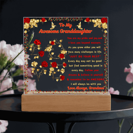 12v acrylic square plaque on a black table
