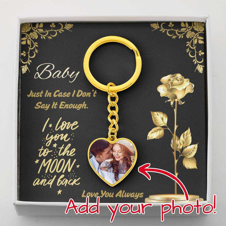 18k gold photo heart keychain in soft box up close