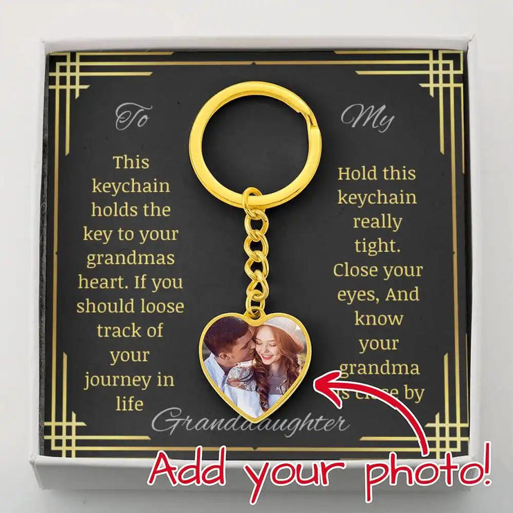 Photo Heart Pendant Keychain with a yellow gold finish and a to granddaughter from grandpa greeting card inside a two-tone box