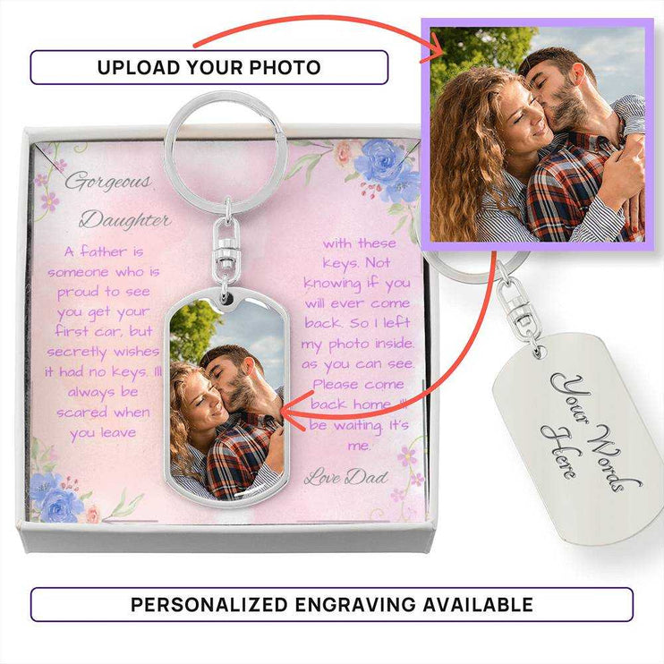 A polished stainless-steel photo upload dog tag swivel keychain in a two-tone box