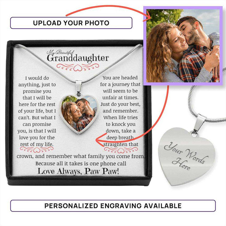 a polished stainless-steel photo upload personalized heart necklace up close in box