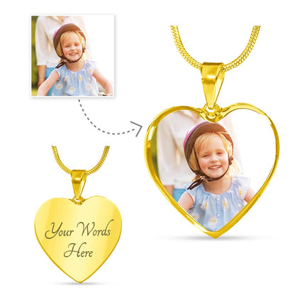 a yellow gold photo upload personalized heart pendant necklace showing engraving.