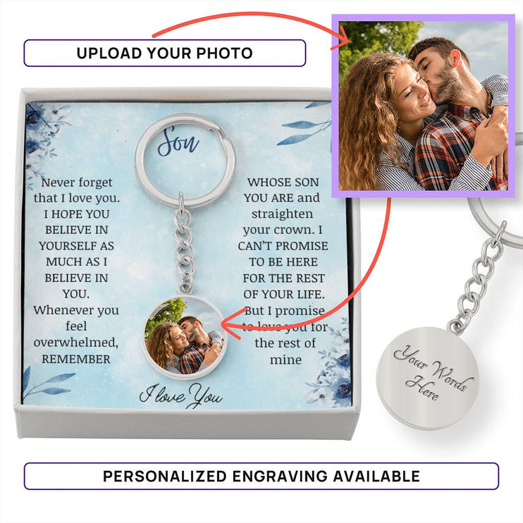 a Photo Upload Personalized Circle Pendant Keychain in polished stainless steel in a two-tone box.