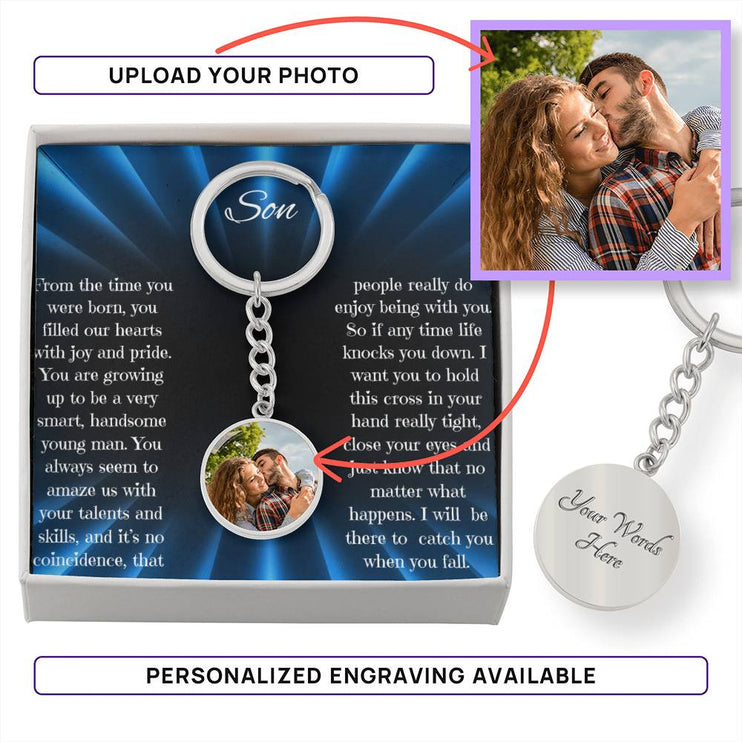 Photo Upload Personalized Circle Pendant Keychain with a stainless-steel finish inside a two-tone box.