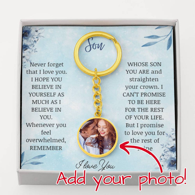 a Photo Upload Personalized Circle Pendant Keychain in yellow gold finish in a two-tone box